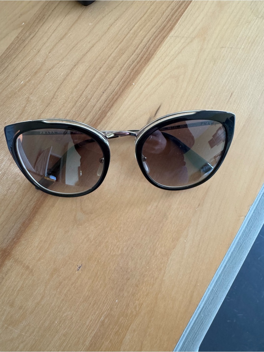 Prada Black Frame Sunglasses with Brown Gradient Lenses